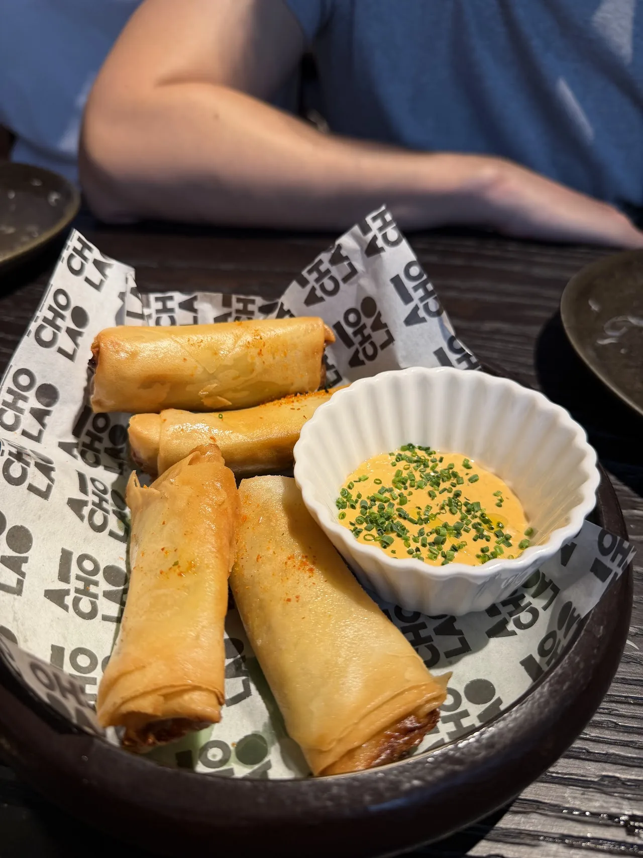 Fried spring rolls served with a dipping sauce