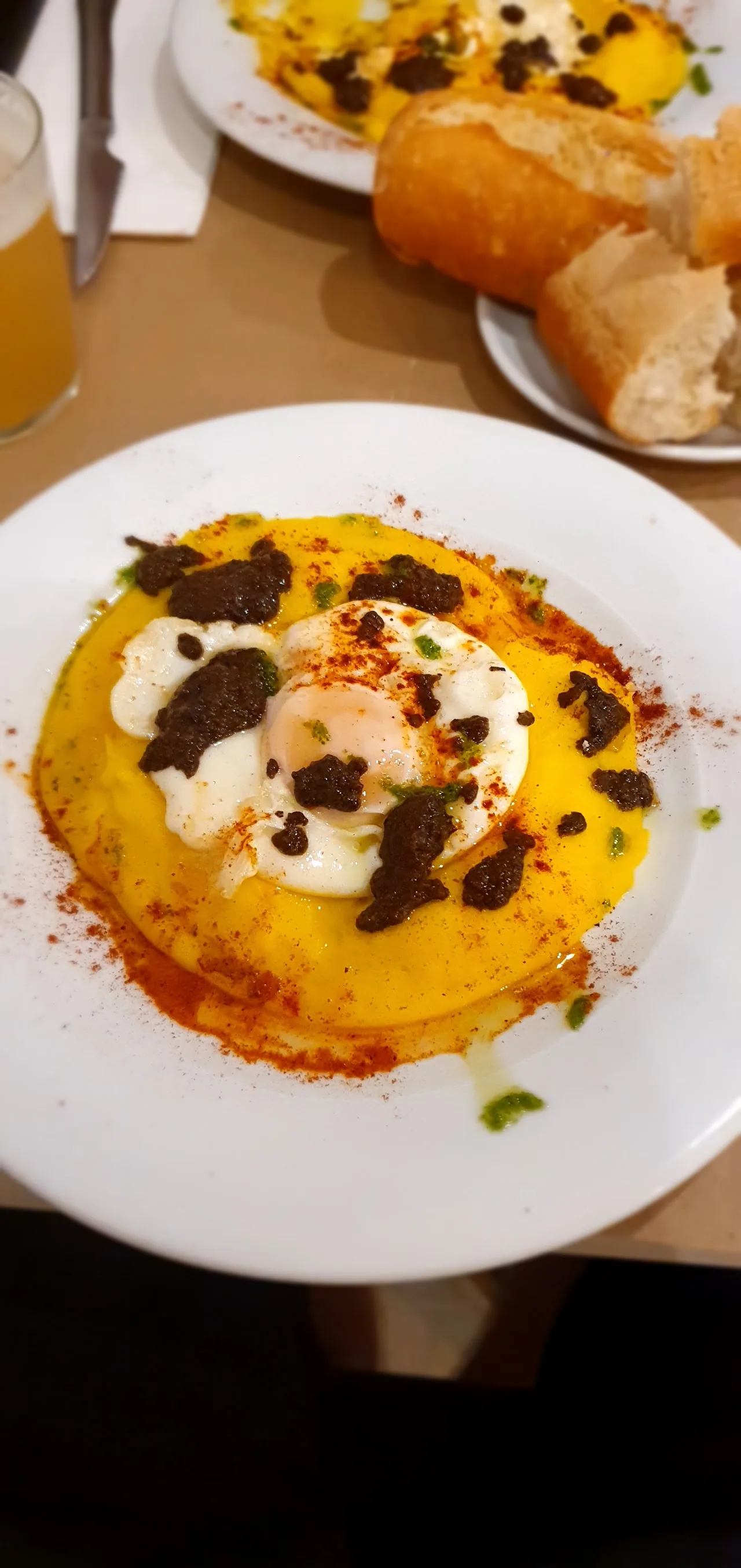 A poached egg dish on toasted bread