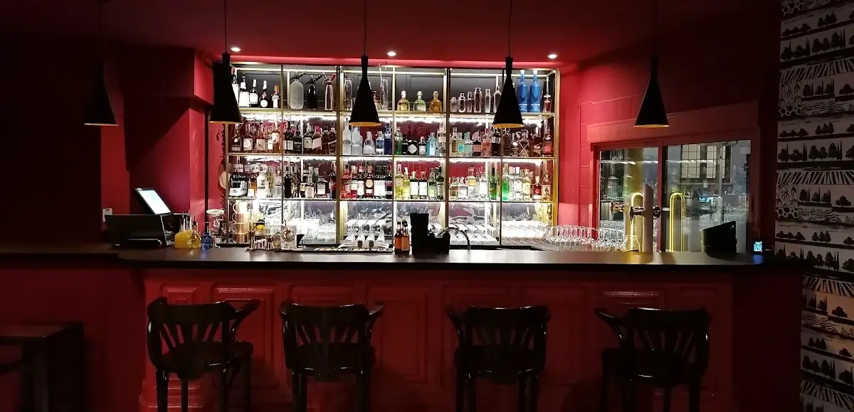 The red-lit bar at After Landing Cocktail Art in Palma