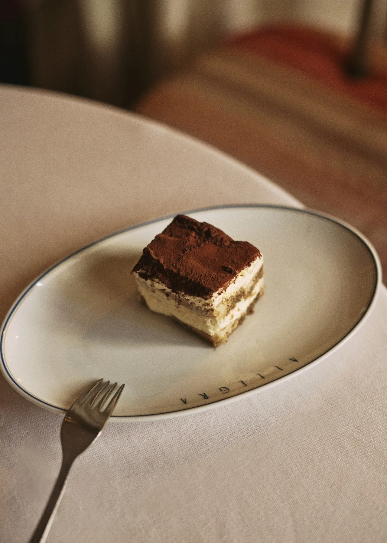 A slice of tiramisu on a plate