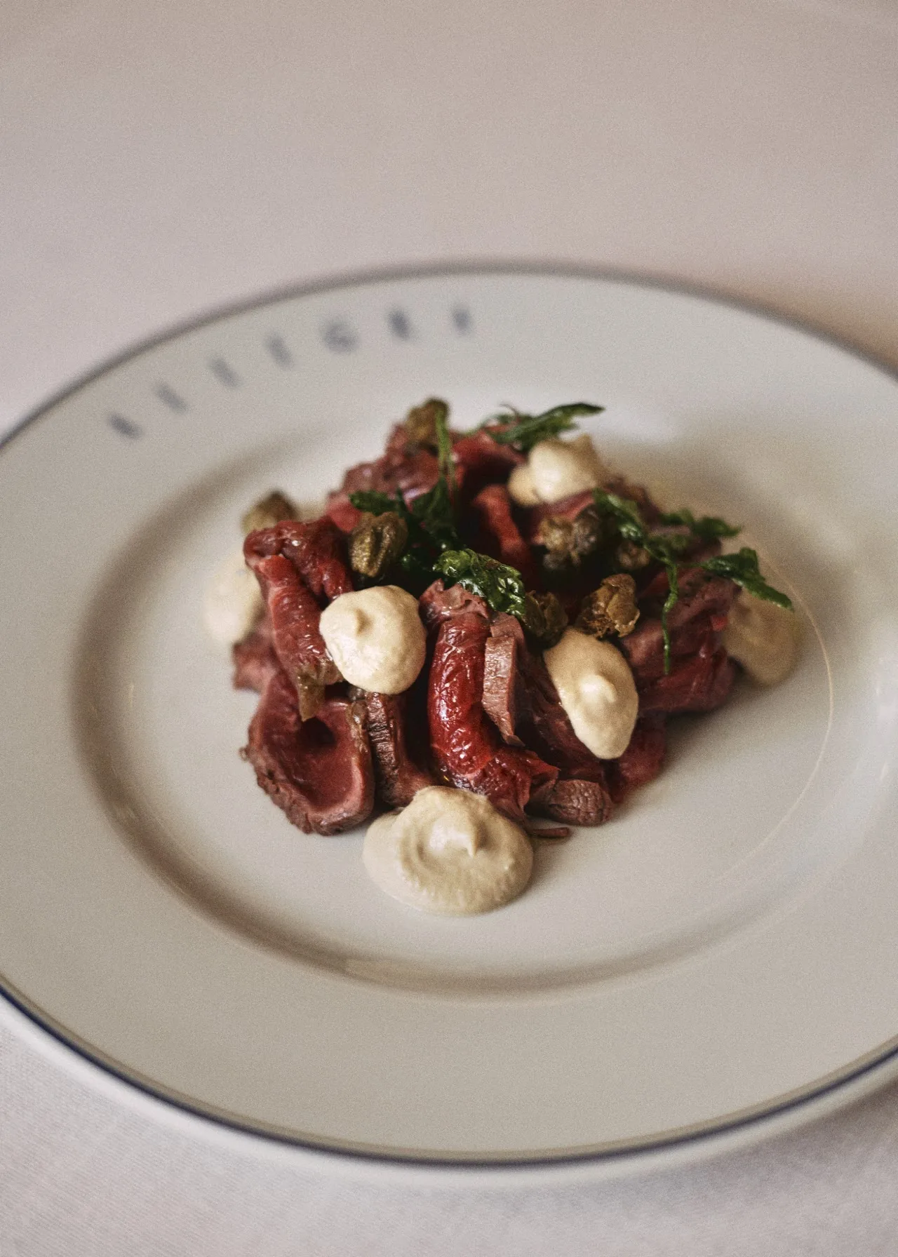 Octopus carpaccio with capers