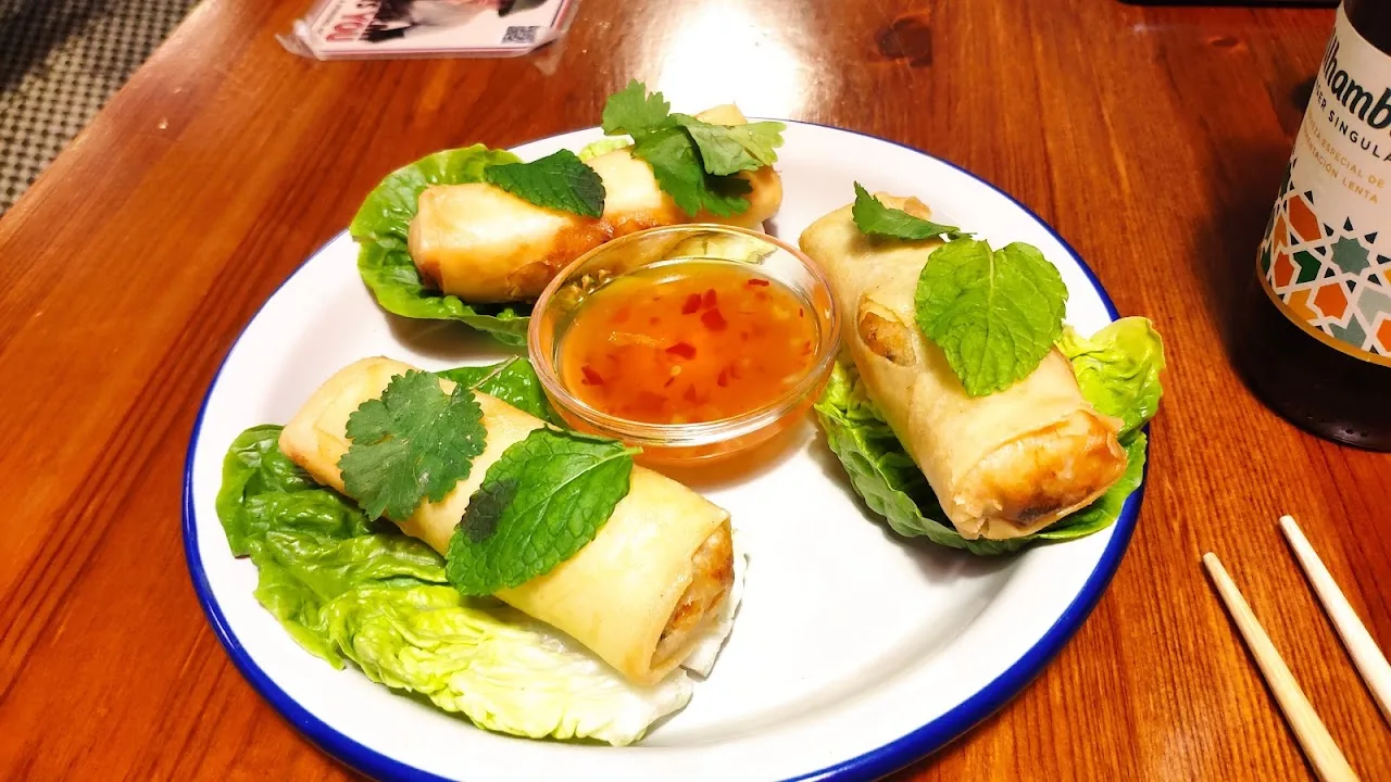 Spring rolls wrapped in lettuce with mint and a dipping sauce