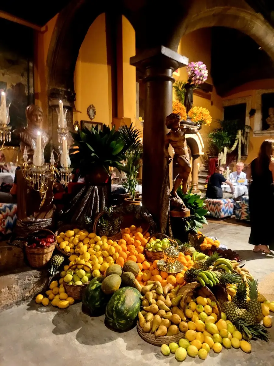 The signature fruit display beneath the arches at Bar Ábaco