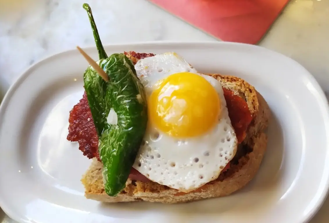 A tosta with fried egg at Bar España