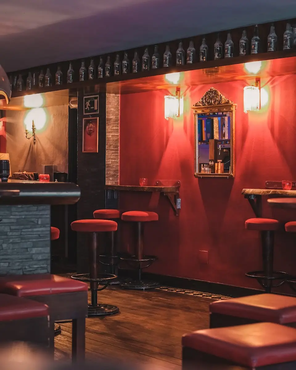 The red-lit bar at LAB Cocktail Bar in Santa Catalina