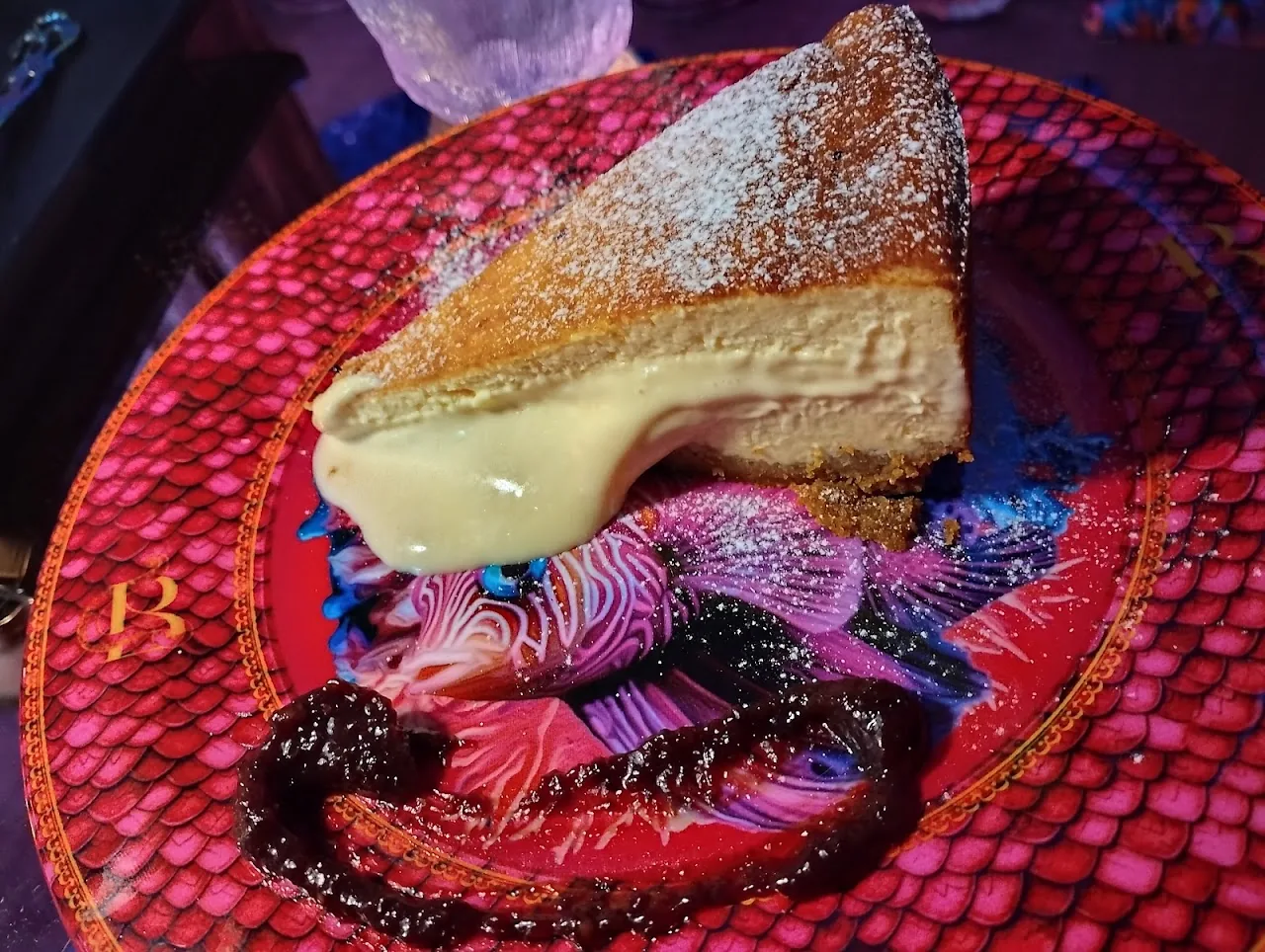 A slice of tiramisu-style cake with a caramel drizzle