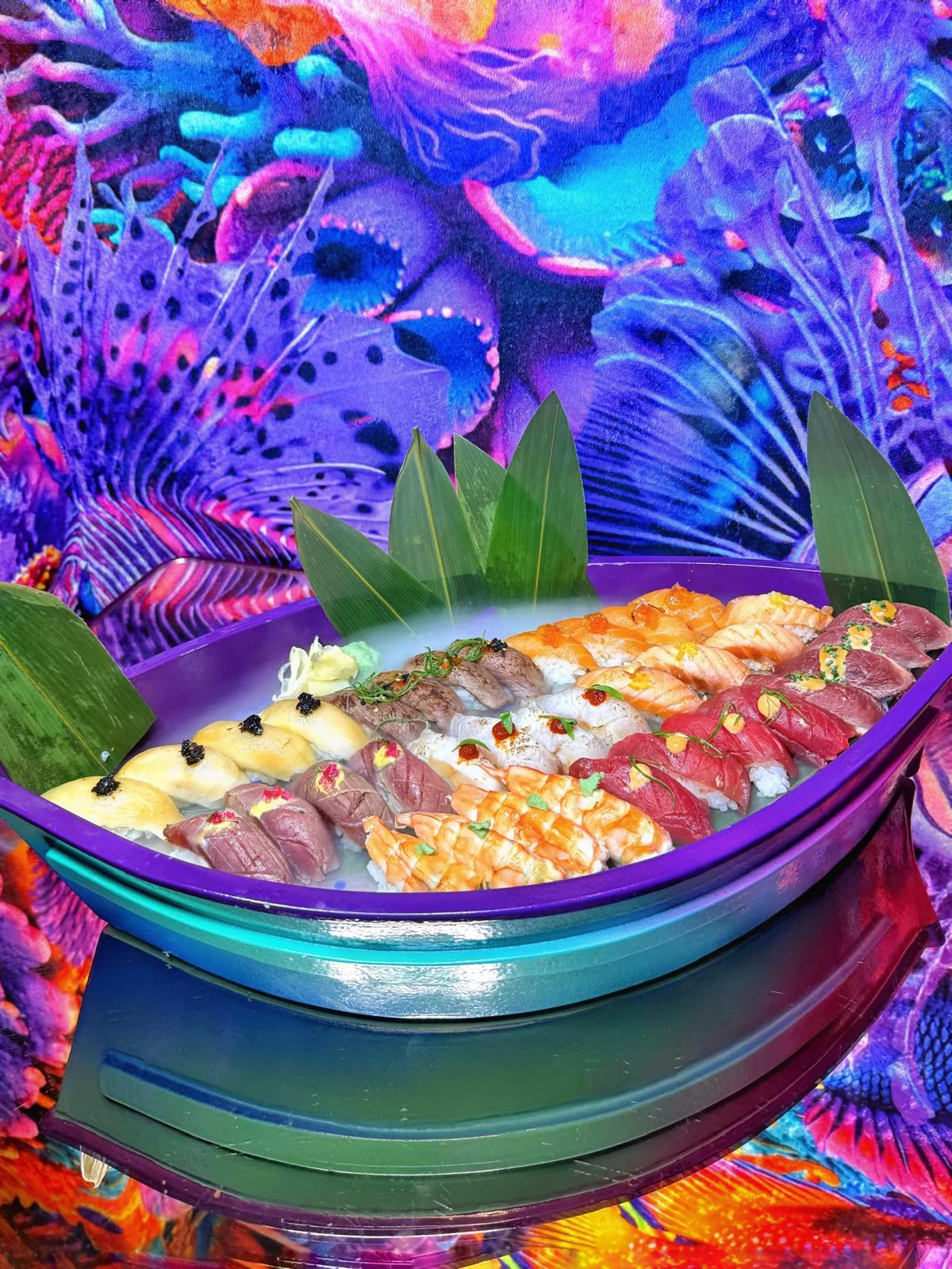 An overhead shot of an assorted sushi platter