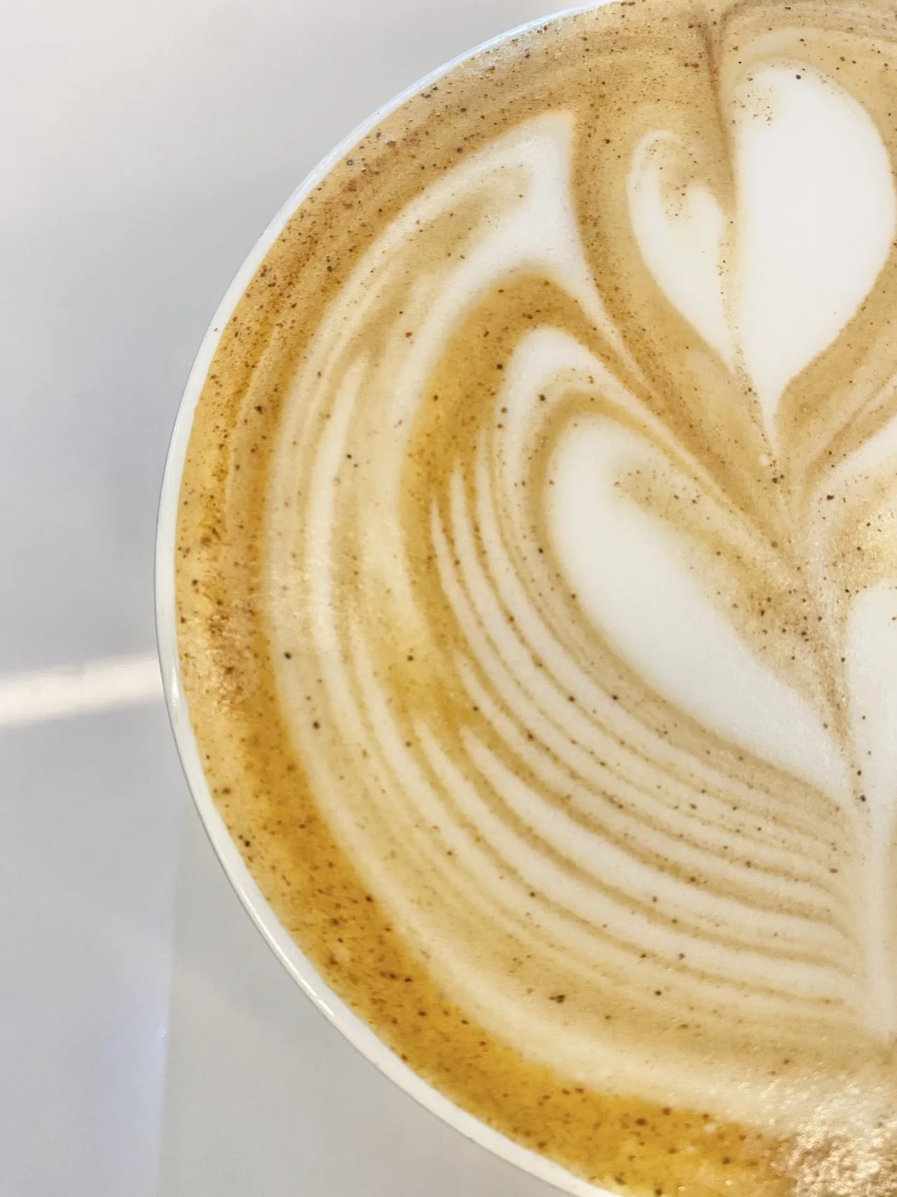 A latte with heart-shaped latte art