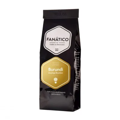 A black retail bag of coffee photographed on white, labelled 'FANATICO by Cafes La Mexicana' with a gold seal reading Burundi