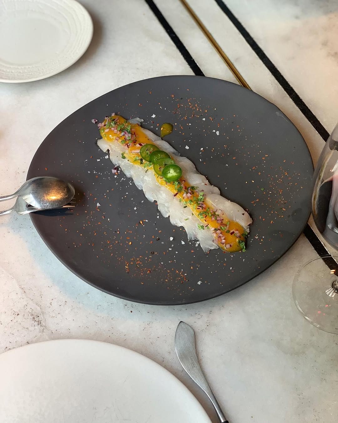 Nuevos platos Raw en carta , tiradito de lubina 🐟 @cannibal_madrid #equipocannibal #raw #madrid #galiciacalidade
