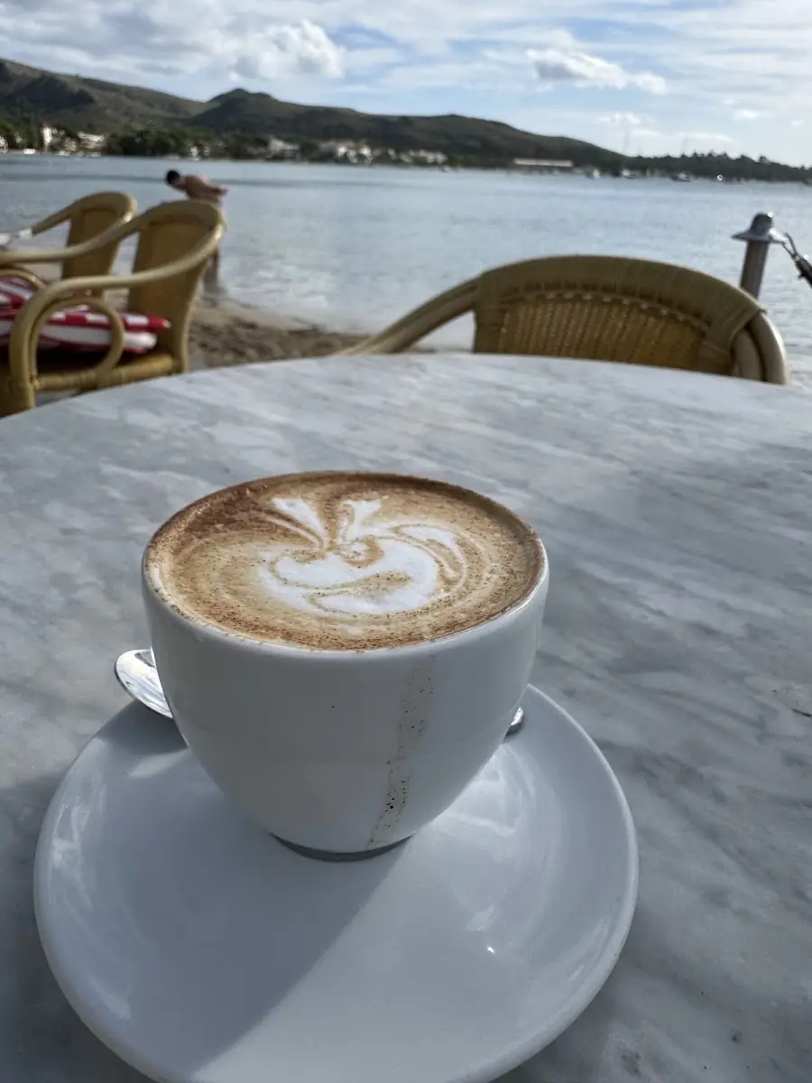 A cappuccino with a sea view at Cappuccino Grand Café