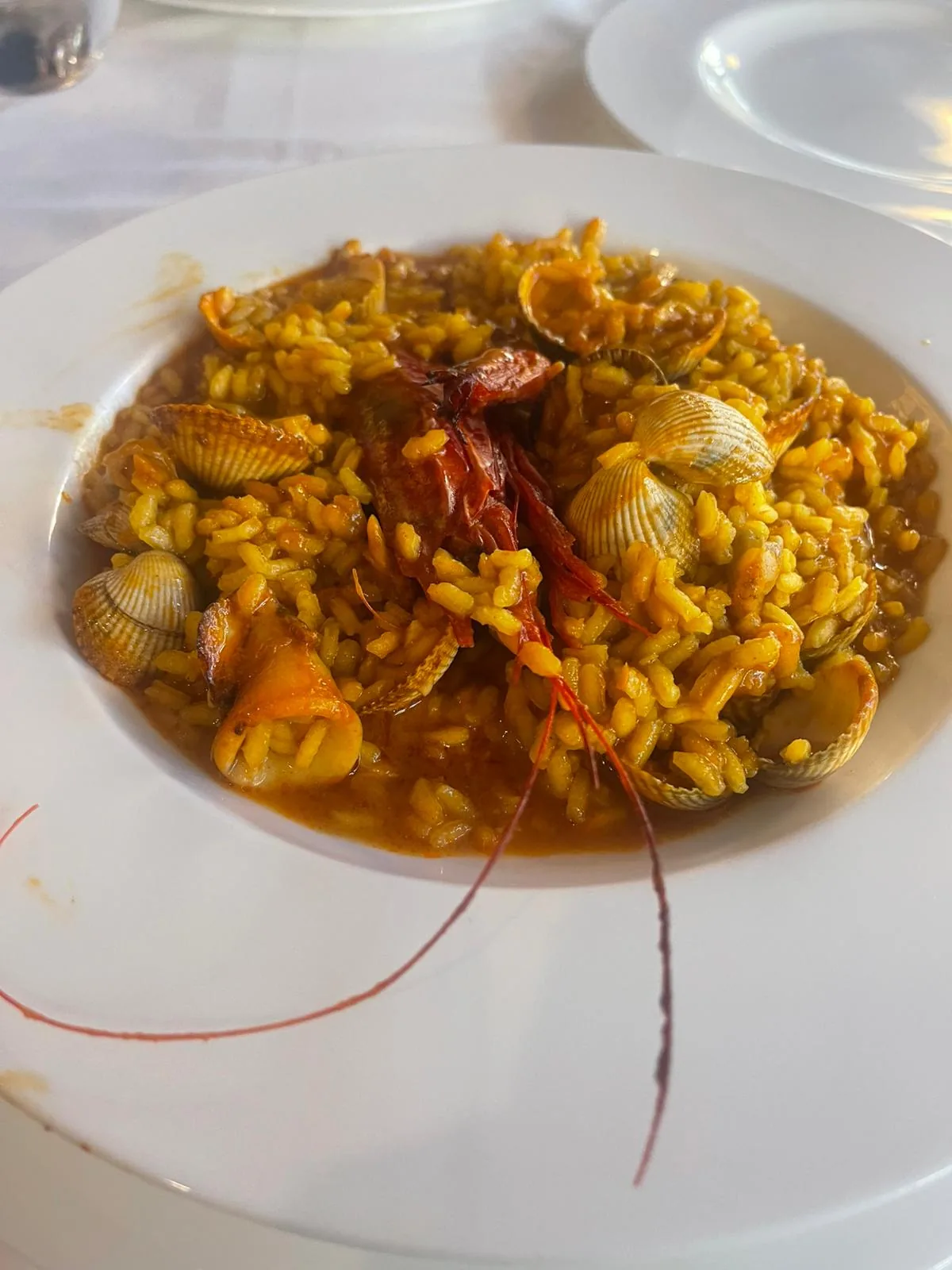 A seafood paella with prawns and mussels