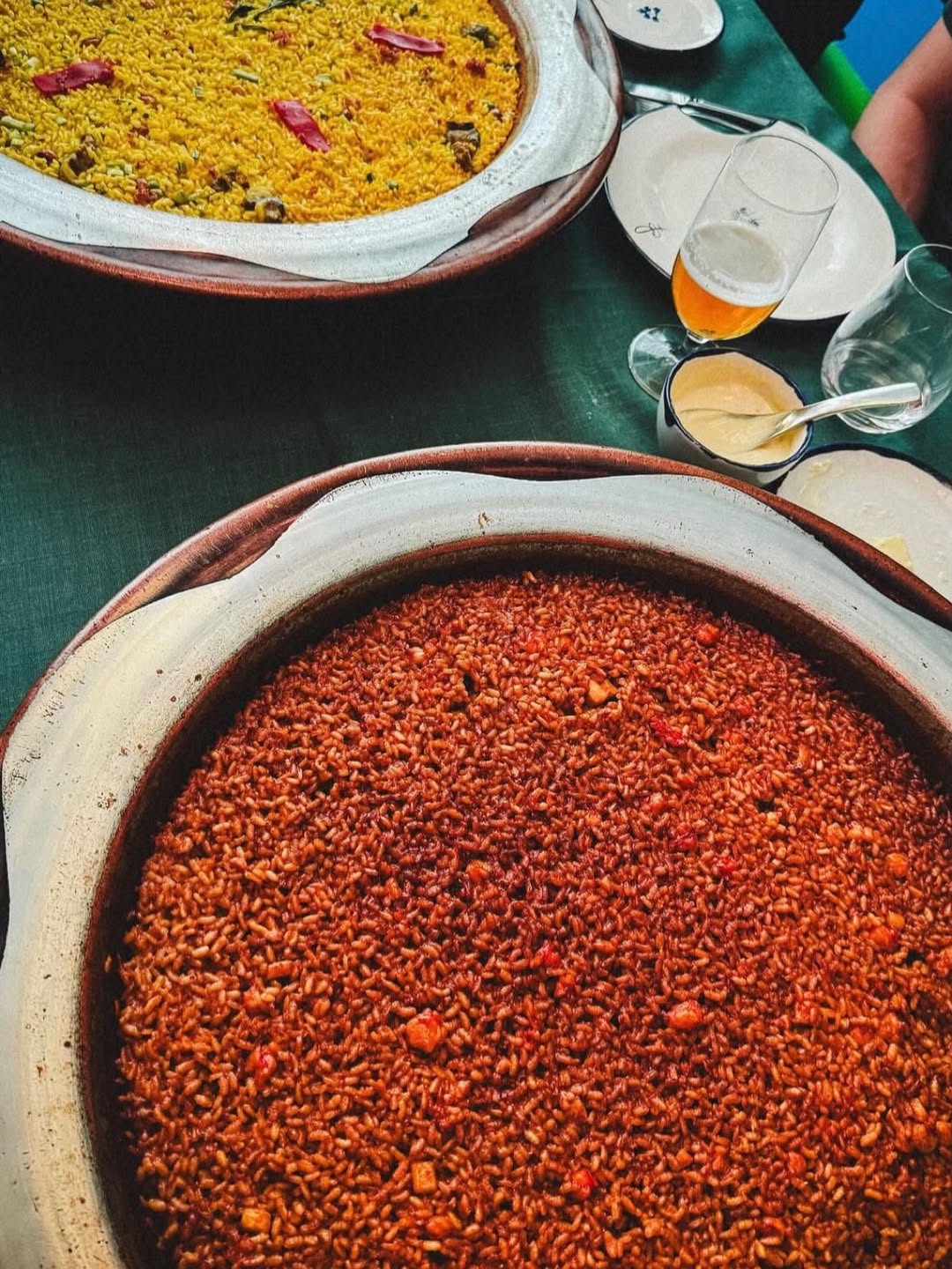 @casabenigna — The paella at Casa Benigna arrives two pans at a time and both of them mean it. The smoked short rib come
