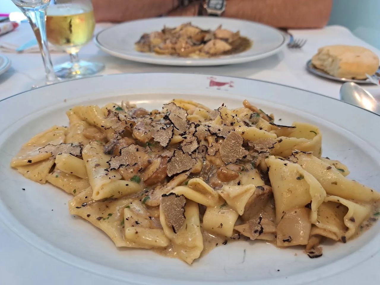 Pappardelle pasta topped with shaved black truffle