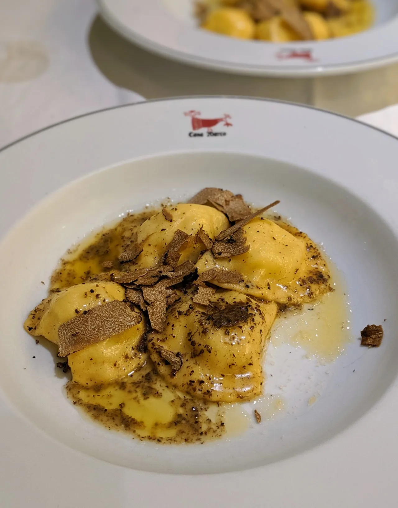 Ravioli topped with shaved black truffle