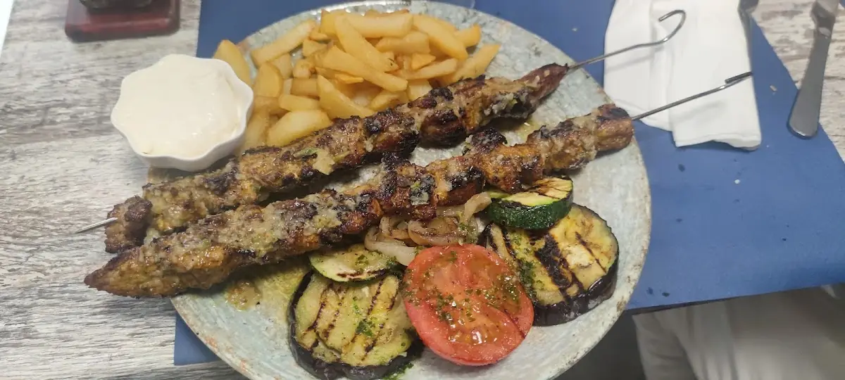 Grilled meat with vegetables at Celler Can Pep
