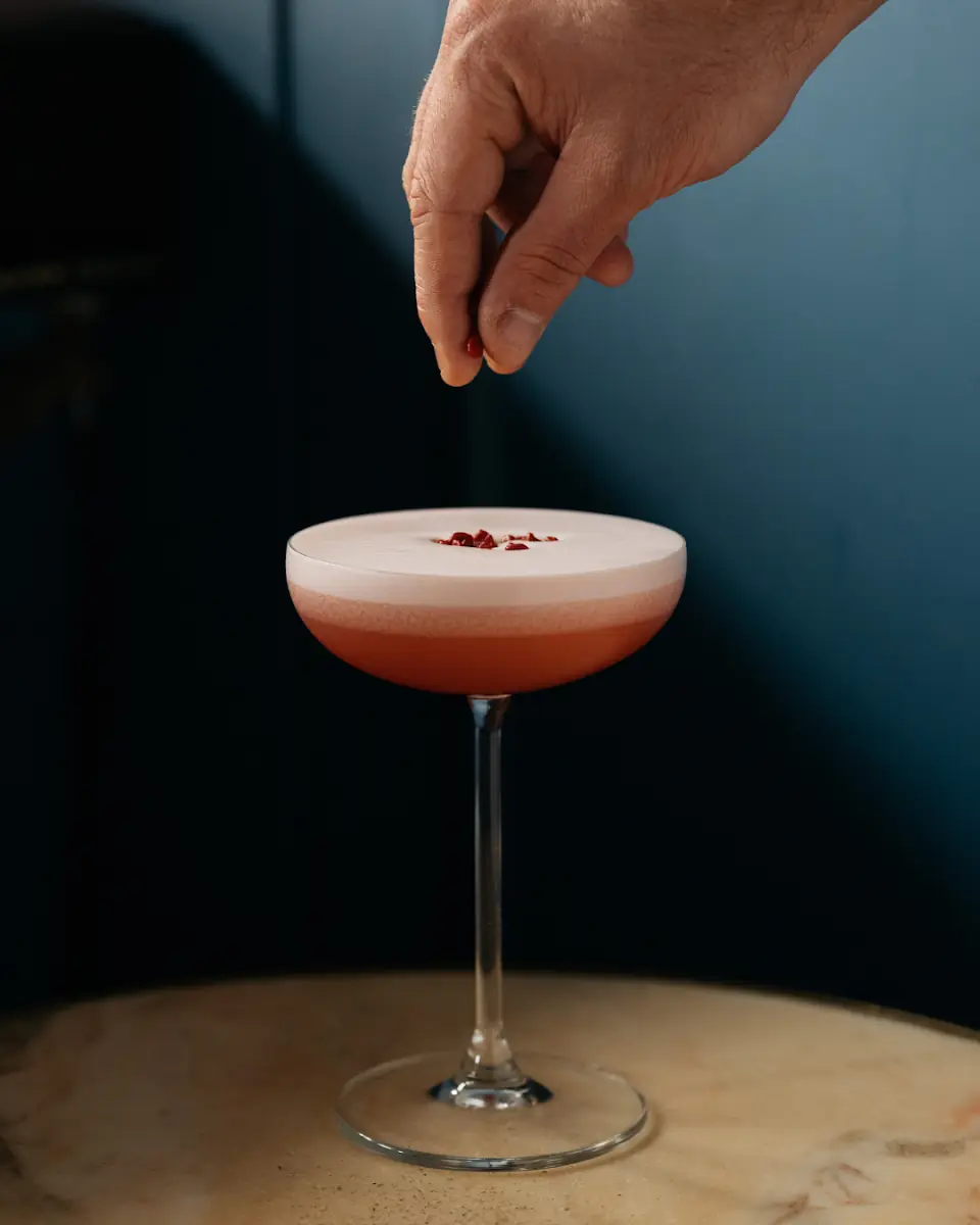 A cocktail being garnished at Chapeau 1987