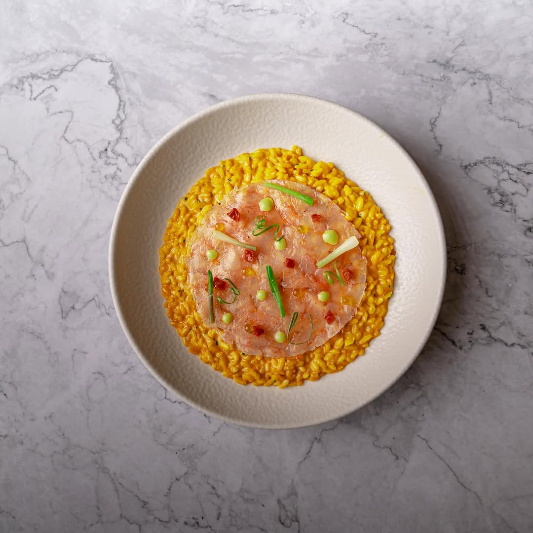 Arroz cremoso y carpaccio de gamba