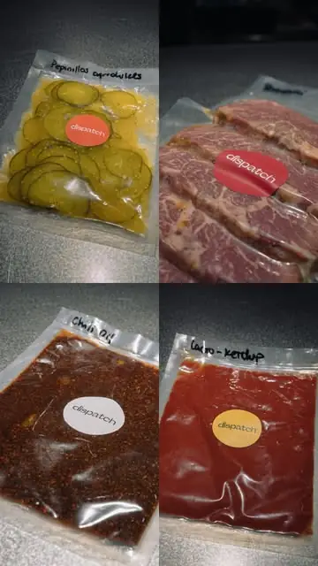 Grid of four vacuum-sealed Dispatch food products: sliced pickles, cured meat, chili oil and a tomato ketchup