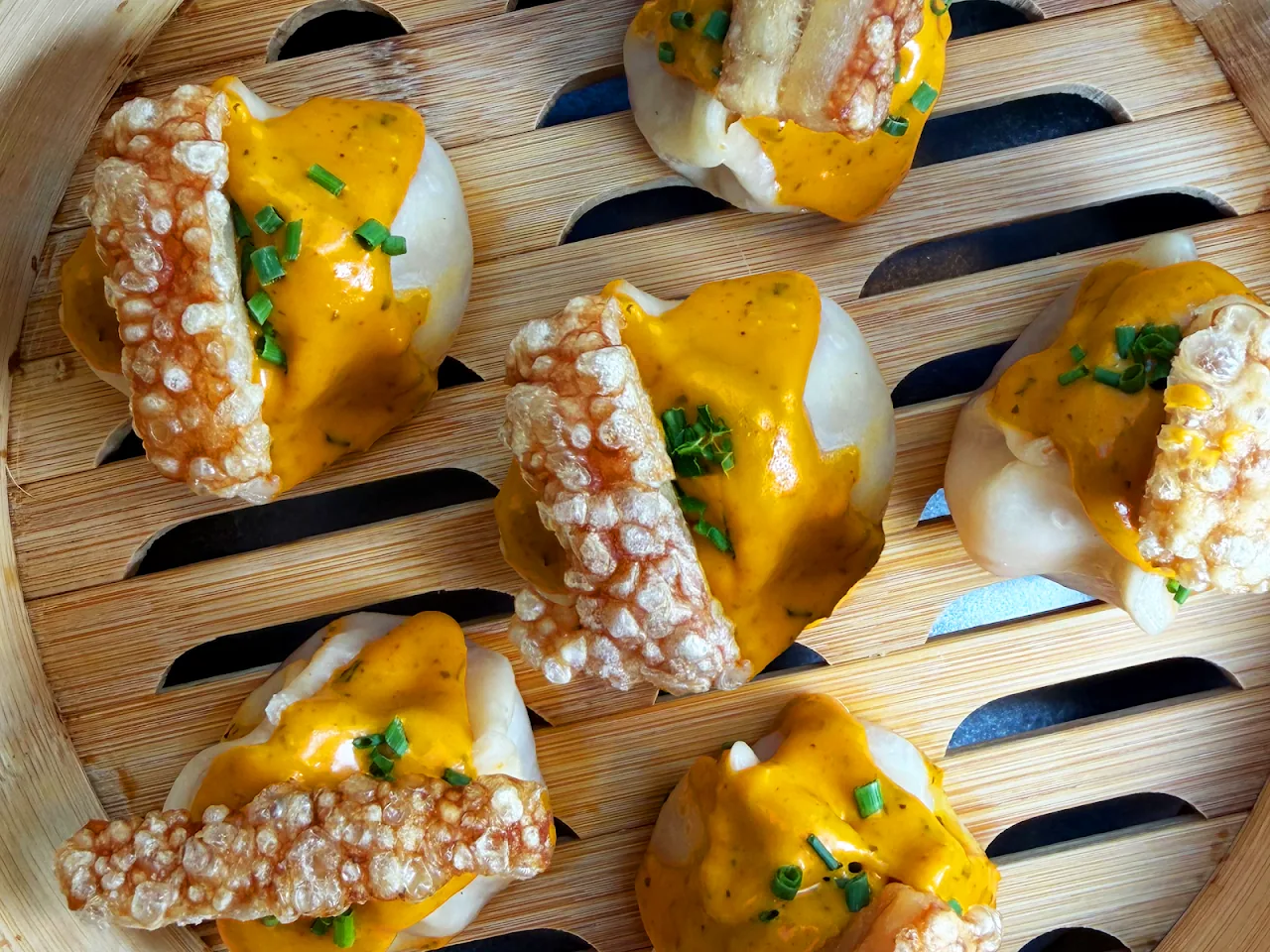 Bao buns filled with a yellow curry-style filling