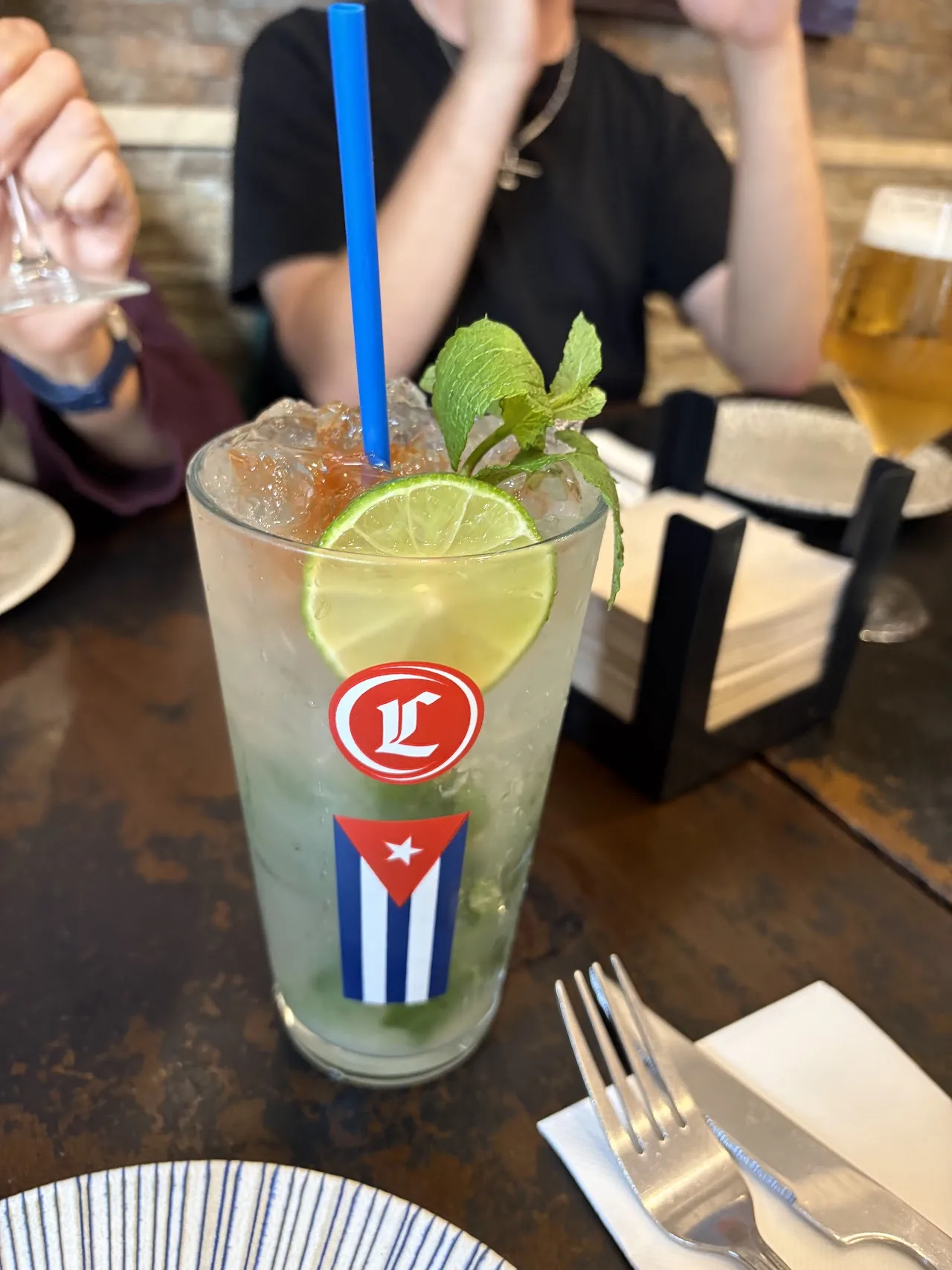 A mojito cocktail with lime and mint
