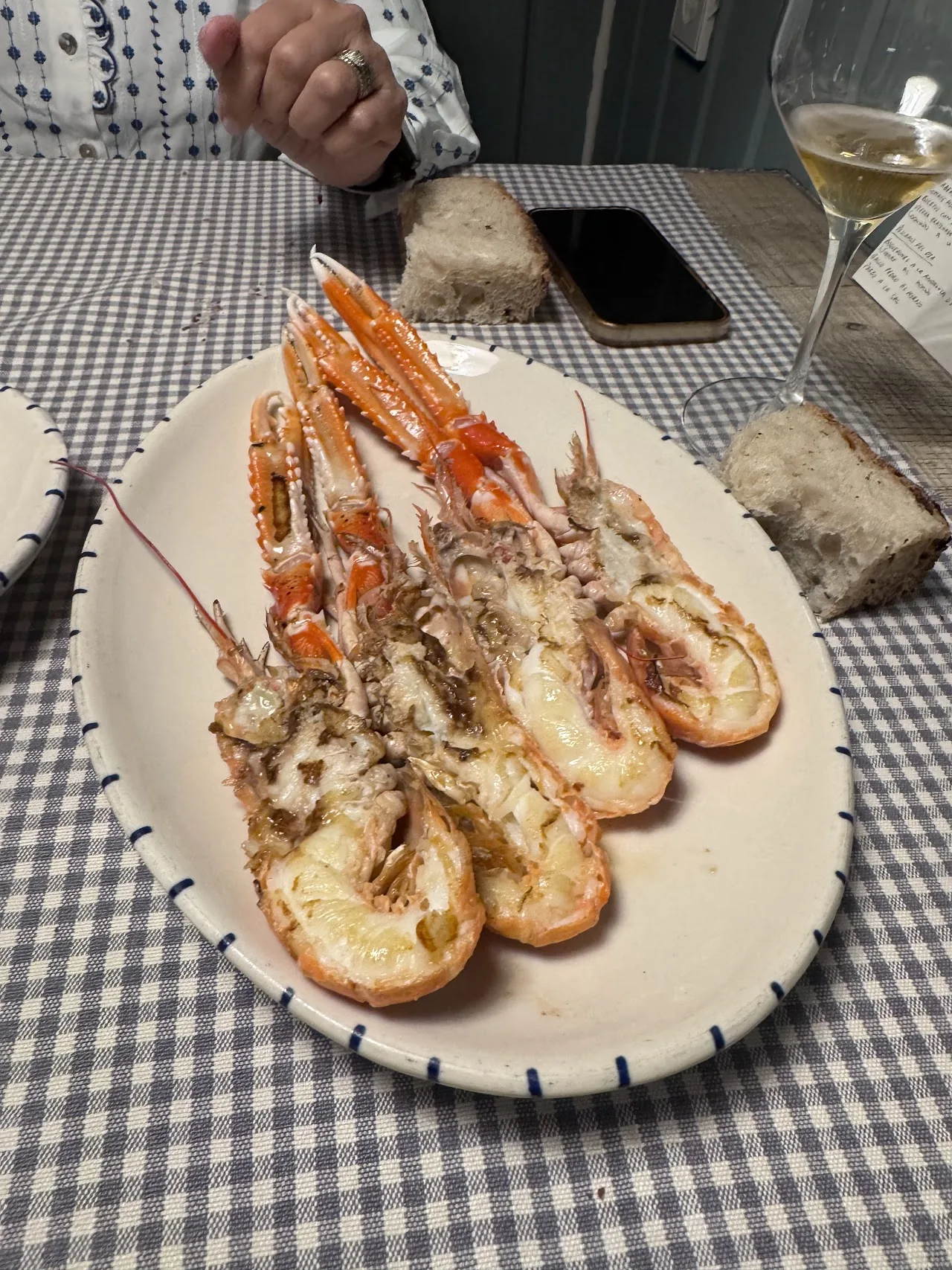 Grilled langoustines served with toasted bread
