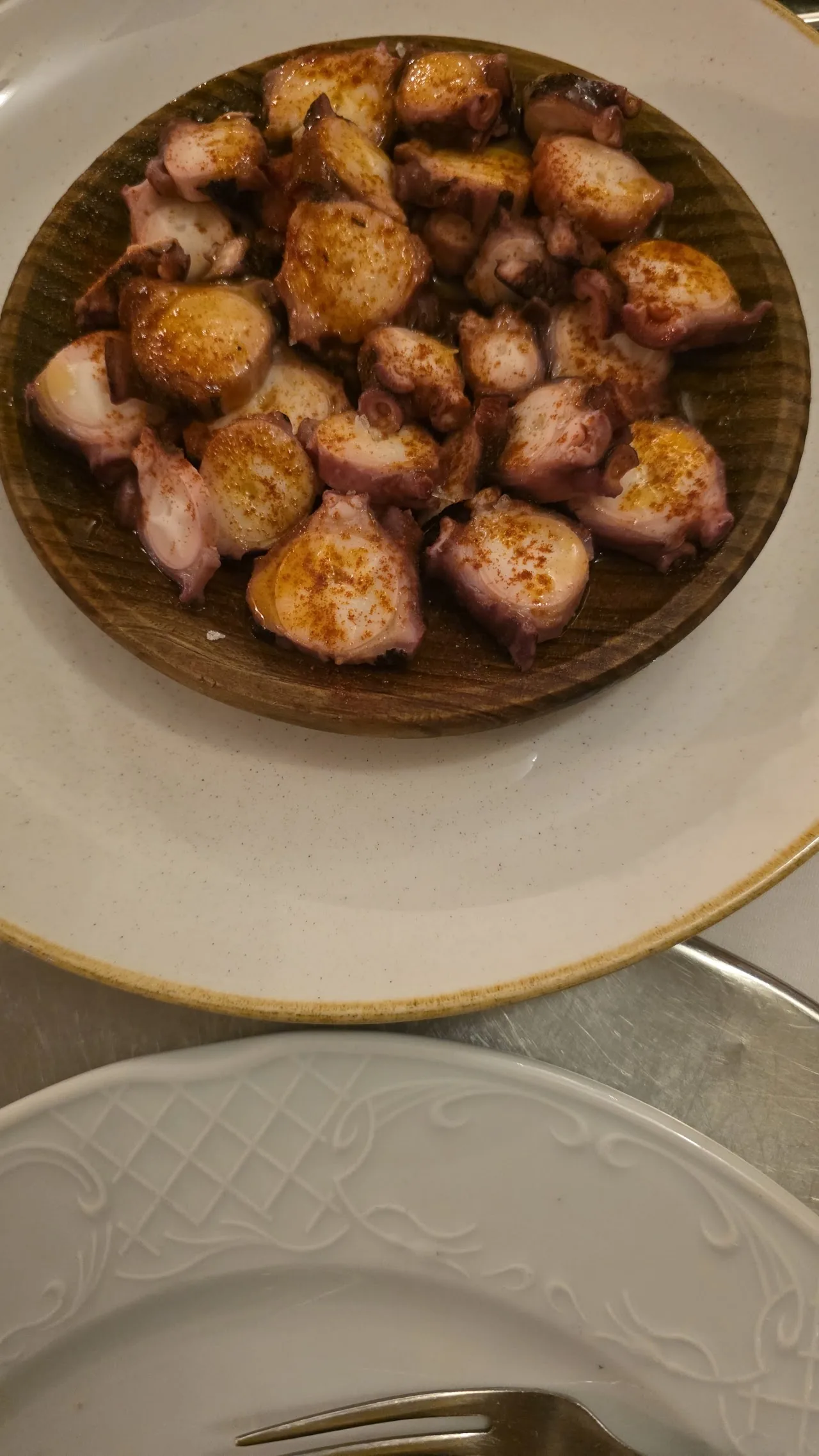 Grilled octopus pieces on a plate