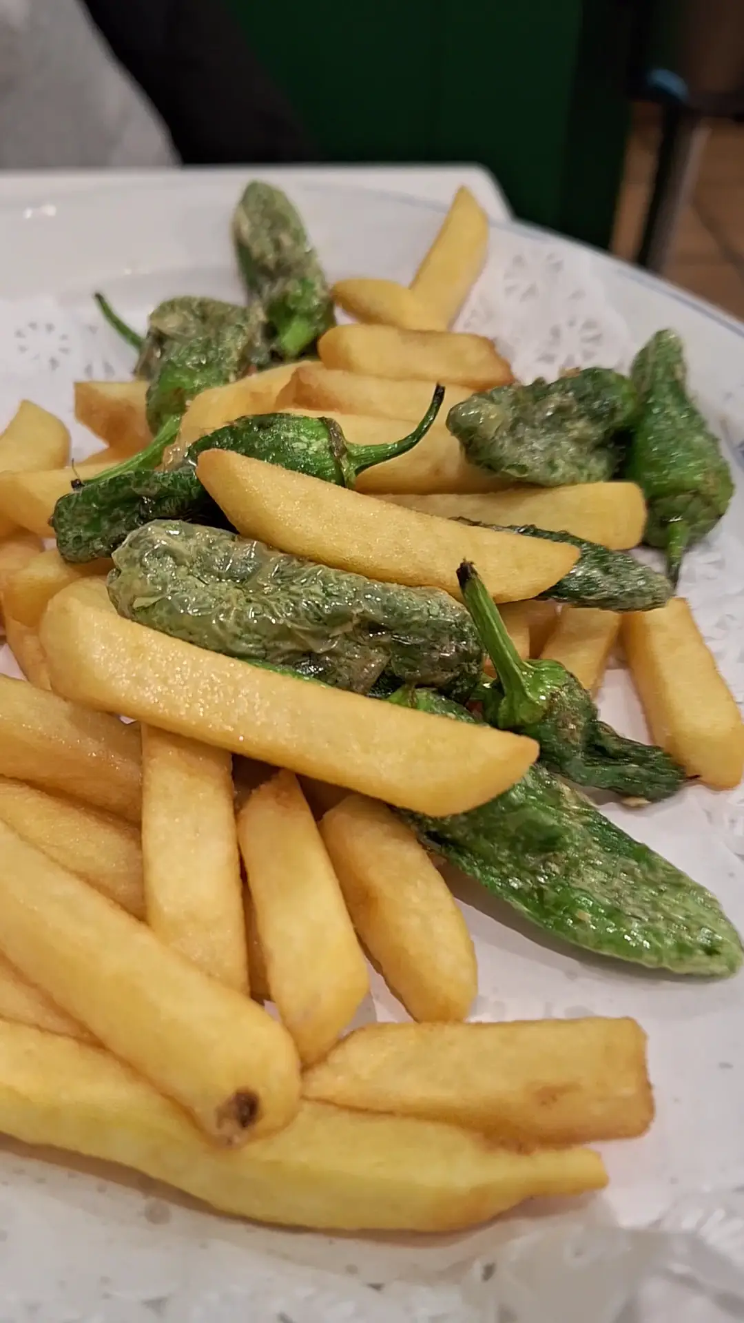 French fries with fried padrón peppers