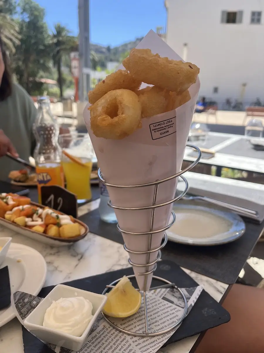 A cone of fried calamari at El Sabor