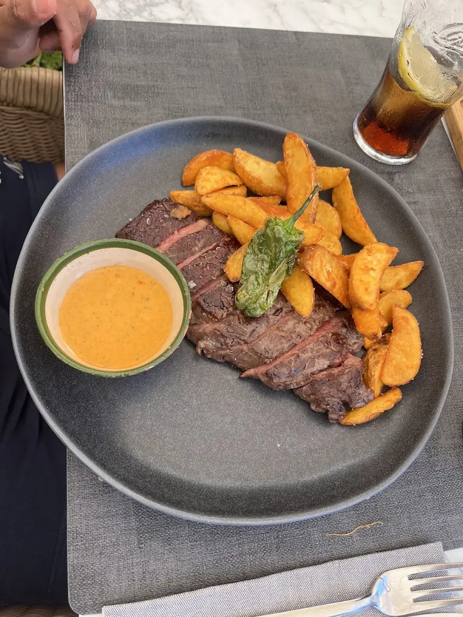 Grilled steak with sweet potato fries at El Sabor