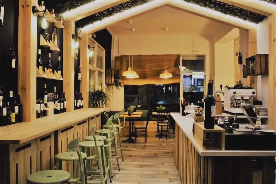 The bar at El Vinho, lined with Portuguese wines