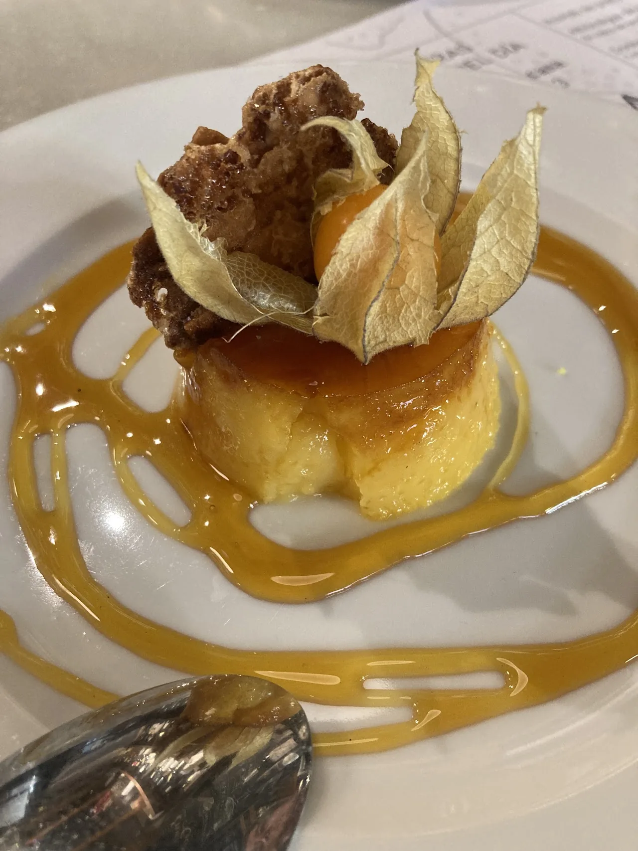 A flan-style dessert with caramel sauce