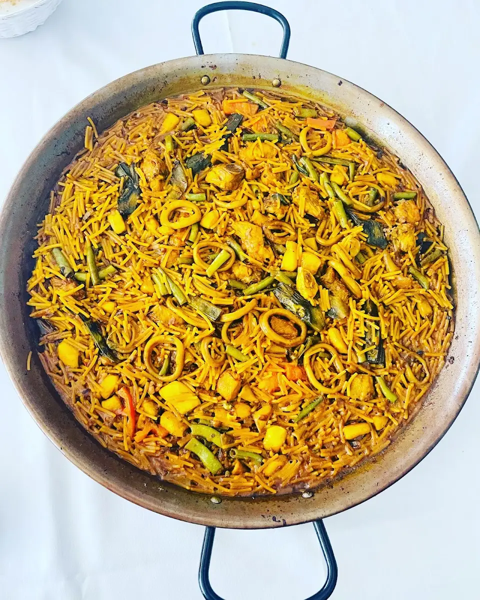 A fideuà noodle paella at Es Mollet