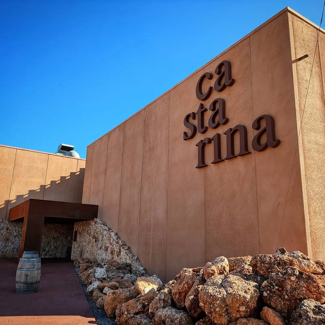 The Santa Catarina winery building under a blue sky