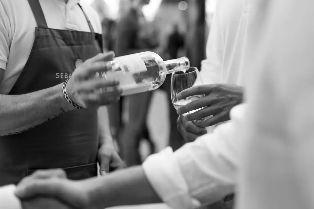 Pouring a glass of Can Axartell wine