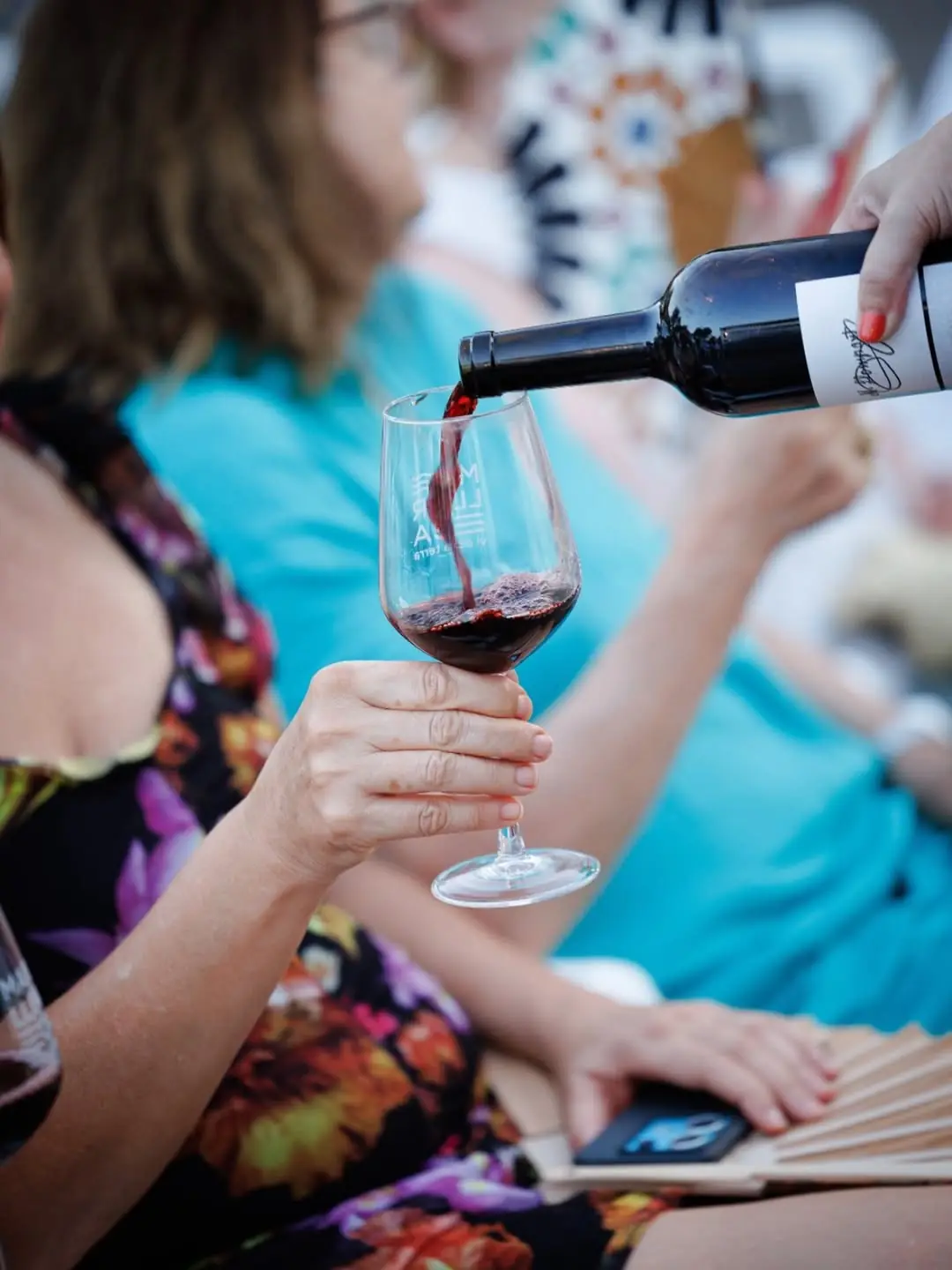 Pouring a glass of Macià Batle red wine