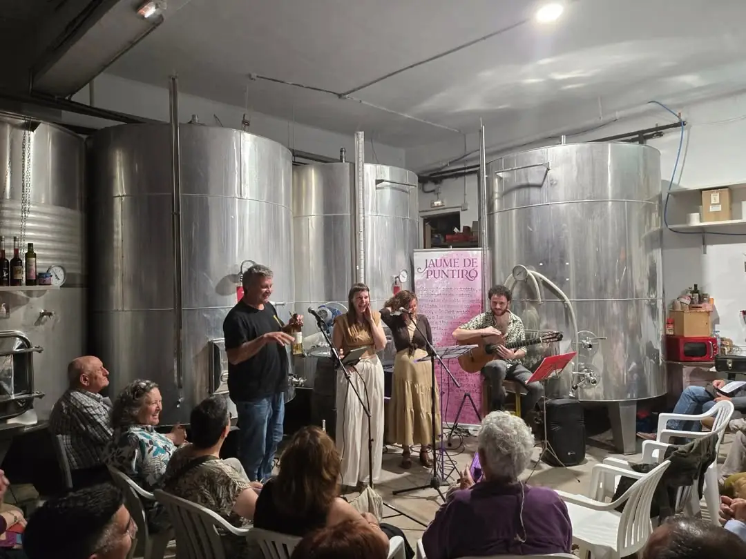 A tasting among the steel tanks at the Jaume de Puntiró cellar