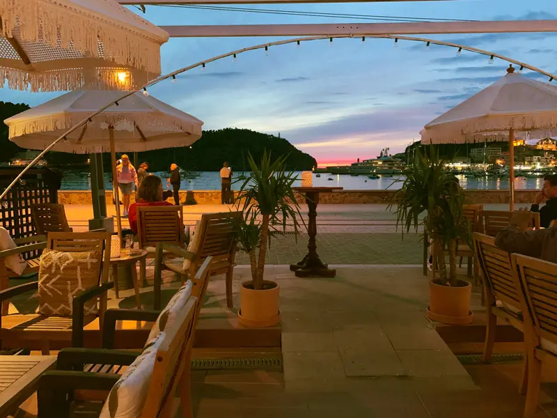 The George's terrace on the Port de Sóller seafront at sunset