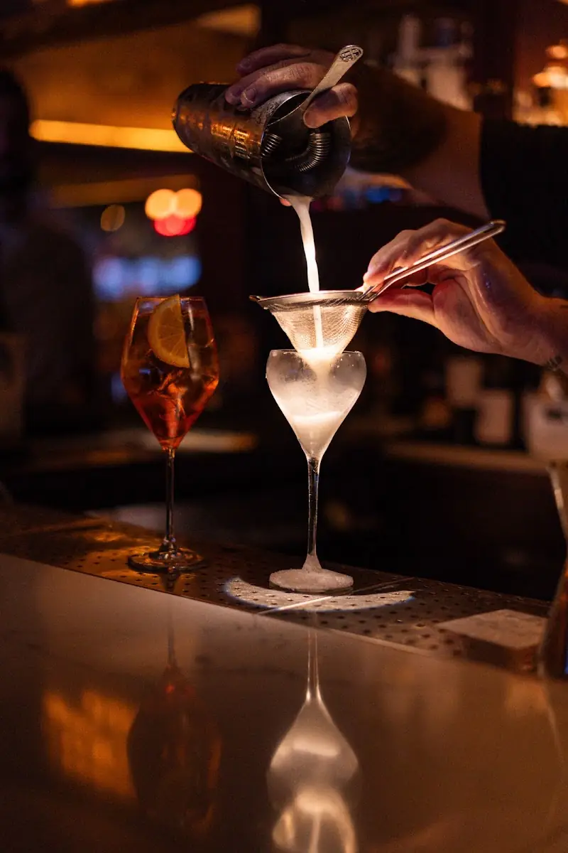 A cocktail being finished at Ginbo
