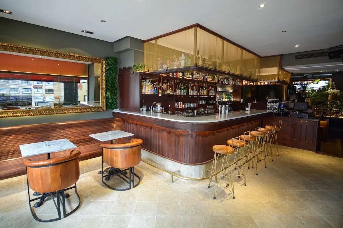 The bar and stools inside Ginbo