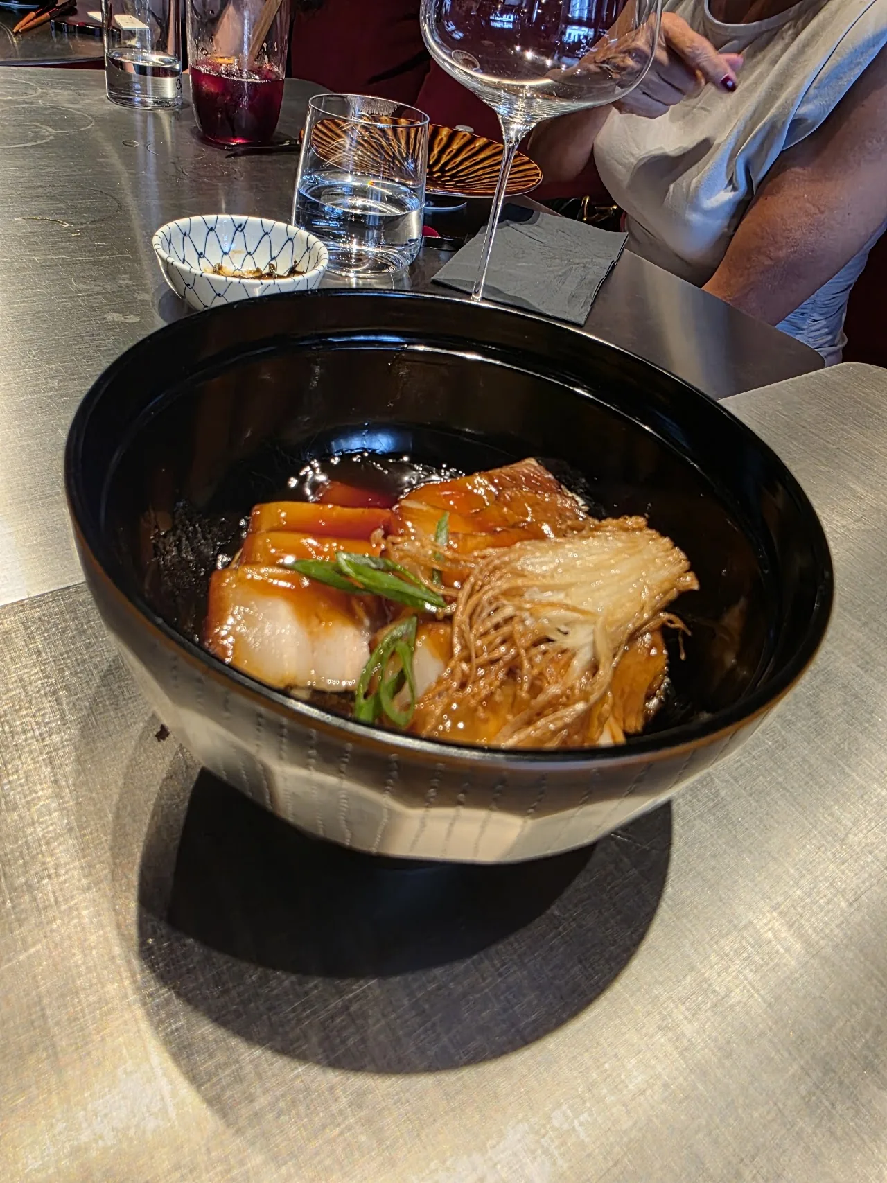 A bowl of noodles with vegetables