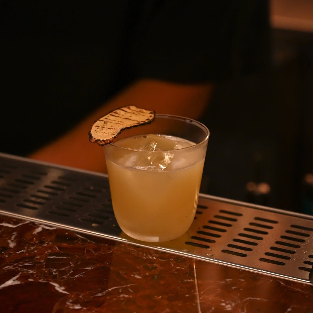 Penicillin, but make it rich in umami.

Smoky, gingery and finished with a hint of katsuobushi.
A Japanese twist on the 