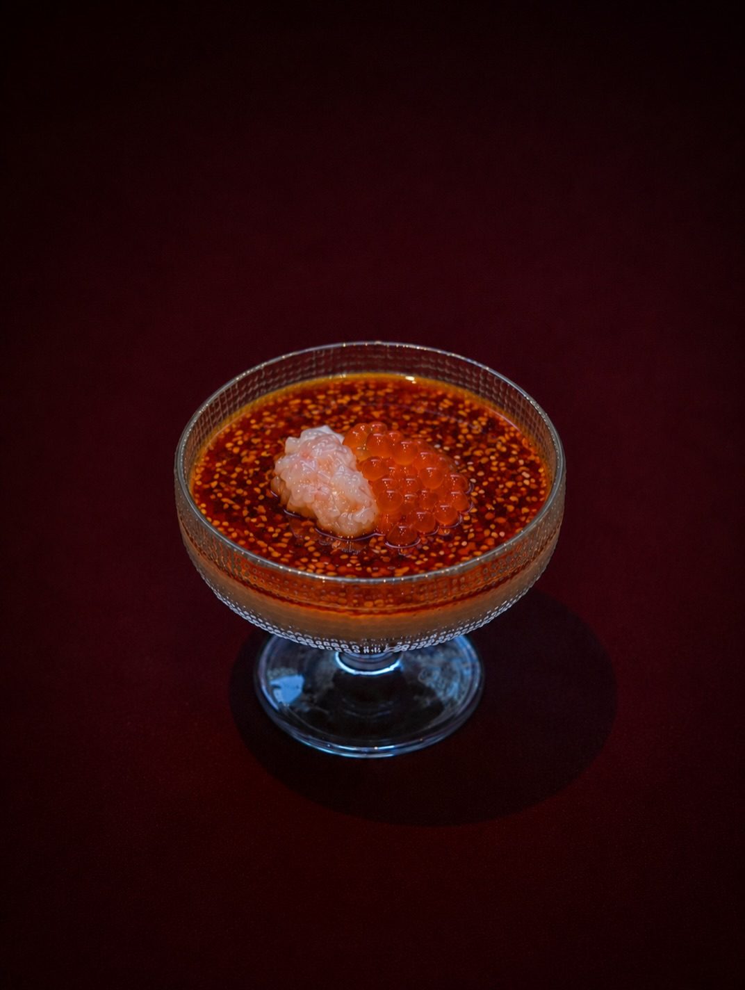 Looks like fire. 
Tastes like comfort.

Silky chawanmushi topped with red prawn tartare, marinated salmon roe and a laye
