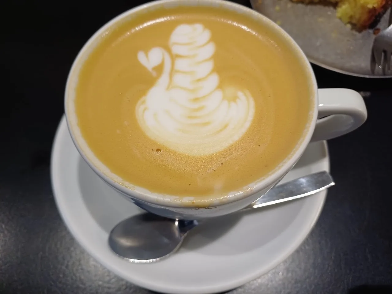 A latte with swan-shaped latte art