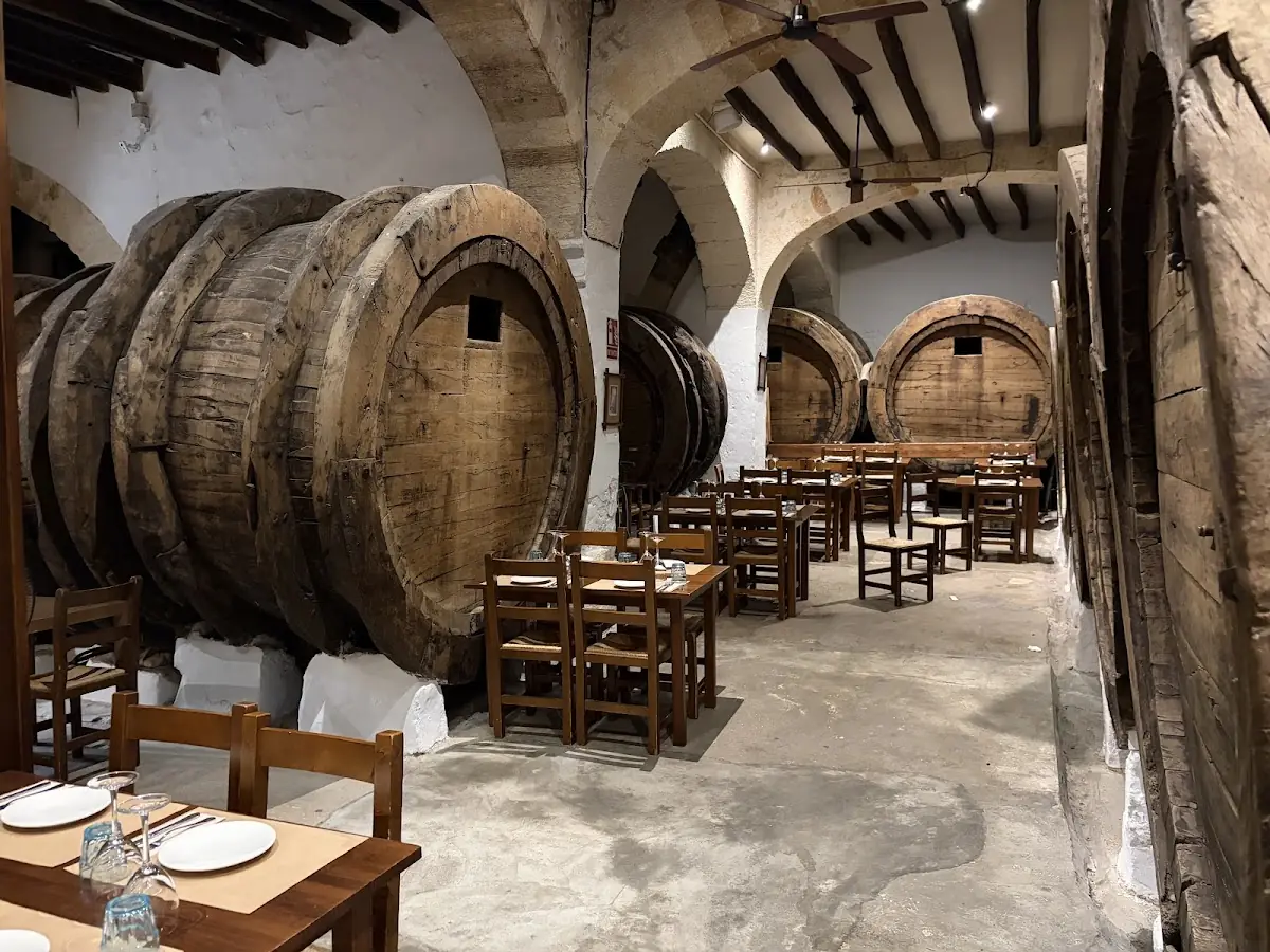 The barrel-lined cellar dining hall at Celler Can Font