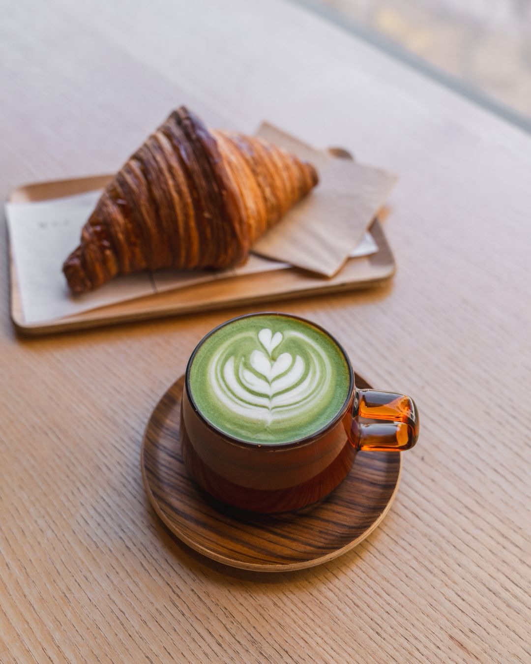 The green glow-up your day needs. 🍵🥐 

Matcha + Croissant = an unmatched pairing 
at Hotto Coffee Lab.
Tag someone who n
