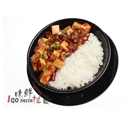 Mapo tofu with steamed white rice in a black bowl, the Igo Pasta wordmark in the lower-left corner