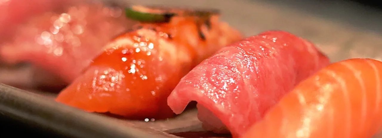 A close view of tuna and salmon nigiri