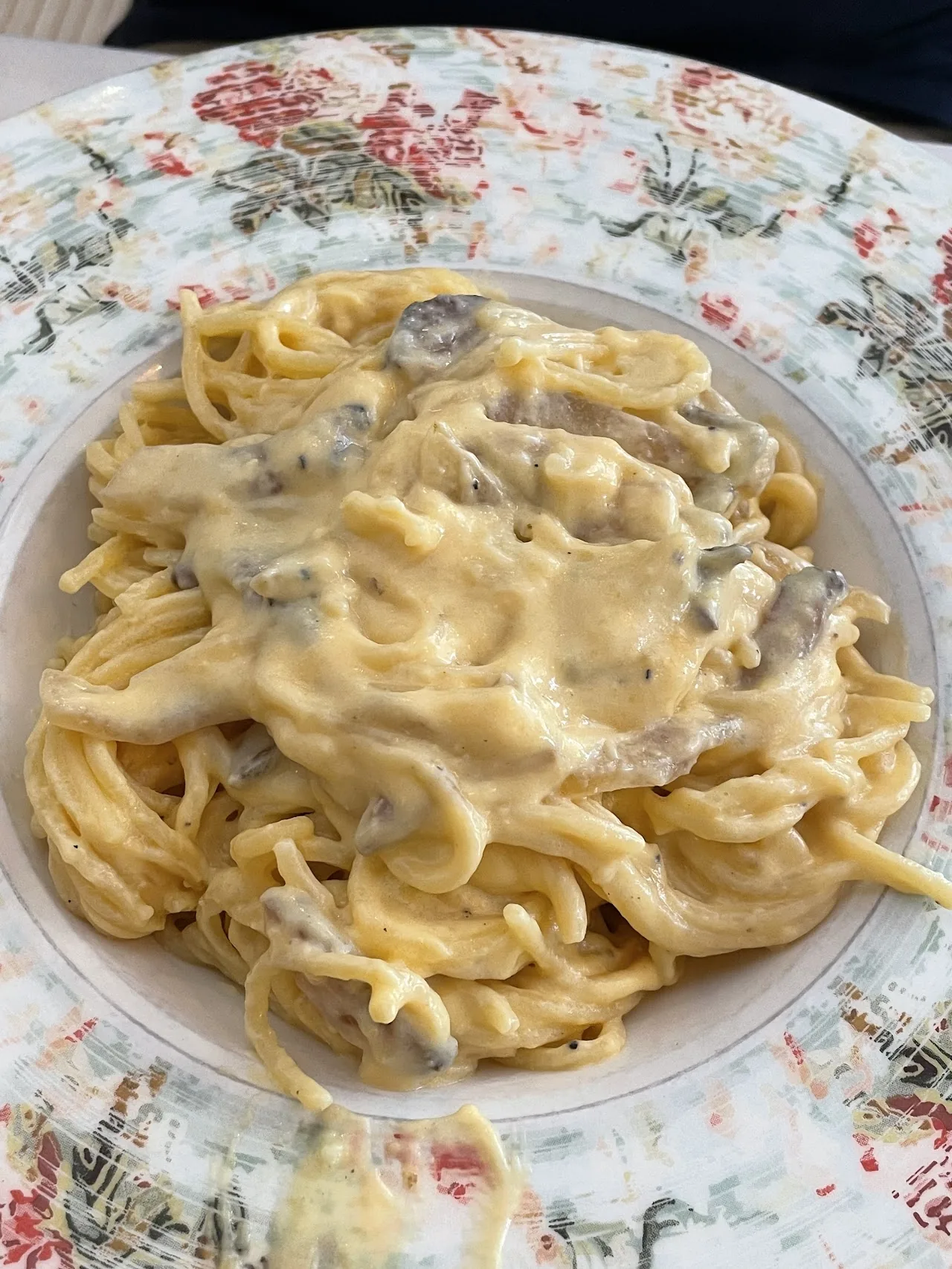 A plate of creamy fettuccine pasta