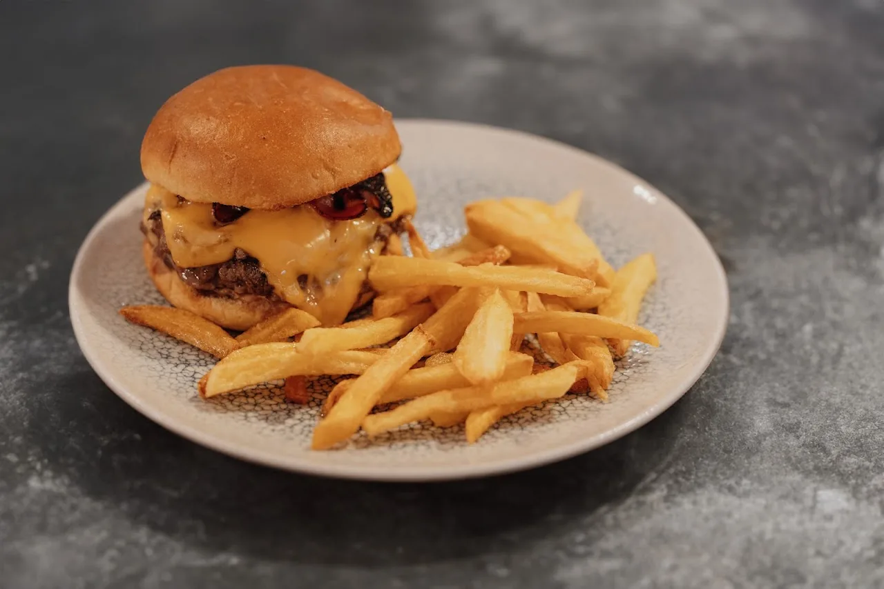 A burger and fries on a plate